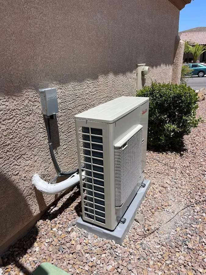 Residential air conditioning condenser unit in Champlin